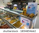 Small photo of November, 2020 - Bangkok, Thailand: Thai people spend benefits of Khon-La-Kring, the 50-50 co-payment program, on small food venders. The 50-50 co-payment program is Thai government’s economic stimulu