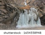 A Frozen Waterfall Near Leh In...