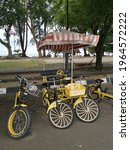 Small photo of Perak, Malaysia. April 28,2021: Scene of CycleDios the smart Malaysian bicycle brand business whereby promote on family activities and relaxation park outdoor for renting at Teluk Batik Resort Center.