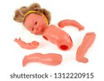 Small photo of Concept of violence with a disarticulated doll