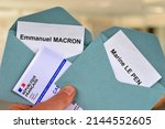 Small photo of Vannes, France, April 10, 2022 : Ballot papers for Emmanuel Macron and Marine Le Pen with a close-up electoral card
