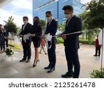 Small photo of BSD City, Indonesia - February 7th 2022: BMW Astra Indonesia inaugurated their 3rd BMW Astra Used Car dealer in BSD City. This is a photo of the management line cutting the ribbon for the inauguration