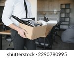 Small photo of Close-up Of A Businessperson Carrying Cardboard Box During Office Meeting.