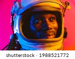 Cinematic image of an astronaut. Colorful portrait of a man with spacesuit