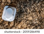 Small photo of Ant trap poison bate on a granite kitchen countertop