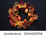 Autumn wreath of fruits and...
