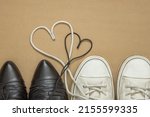 men's and women's pair of shoes, shoelace hearts, family and love concept, mutual feelings, Valentine's day