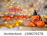 three spooky orange pumpkins.... | Shutterstock . vector #1208270278