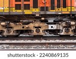 Small photo of Gillette, Wyoming - January 23, 2021: Bottom of a train on railroad tracks on a snowy day near Gillette, Wyoming.