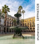 Small photo of Unusual view of the iconic Placa Reial square (Plaza Real) in Barcelona city center, during a sunny day of January. Usually this is one of the most bustling places of the Gothic Quarter
