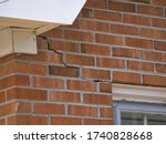 Cracked Brick Foundation, house settling causing bricks crack