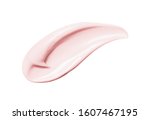 Pink cosmetic cream smear isolated on white background. Peach color beauty creme swipe. Skincare product creamy texture. Color corrector smudge swatch