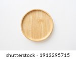Top view of wooden dish for kitchen background. Close-up image.