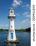 Small photo of CARDIFF, WALES - JUNE 8 : Lighthouse in Roath Park commemorating Captain Scotts ill-fated voyage to the Antartic in Cardiff on June 8, 2013