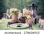 Wedding table setting in rustic style.