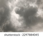 Small photo of Dusk gray sky.Overcast sky in rainy season. Atmosphere of overcast sky before to rainy. Dark cloudy against white sky. Rain cloudy floating frame.