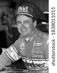 Small photo of Long Pond, PA / USA - July 22, 1990: A vintage, old-school black-and-white photo of NASCAR stock car driver Geoff Bodine in the garage at Pocono Raceway in Pennsylvania.