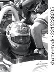 Small photo of Nazareth, PA, USA - April 8, 2000: A grainy, old-school black-and-white photo of race driver Kenny Brack competing in the 2000 Bosch Spark Plug GP at Nazareth Speedway.