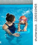 Little Girl Learning To Swim In ...