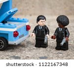 Small photo of Winnipeg, Manitoba, Canada - March 2012: LEGO Vincent Vega and LEGO Jules Winnfield are thinking that "they should have shotguns for this type of deal." (from "Pulp Fiction")