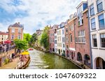 stock-photo-traditional-houses-on-the-oudegracht-old-canal-in-center-of-utrecht-netherlands-1047609322.jpg