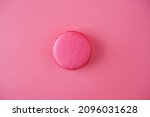 Pink macarons with chocolate berry cream cheese filling. toning. selective focus 