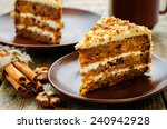 carrot cake with walnuts, prunes and dried apricots on a dark wood background. tinting. selective focus