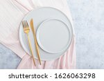 Plates, fork and knife. Table setting