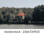 Lonely house on an island in the forest