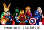 Small photo of KYIV, UKRAINE - MARCH 17, 2024: LEGO Marvel's Avengers. Doctor Strange, Captain America, Thor, Hulk, Spider-Man and Iron Man on a black background