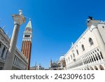Small photo of Venice, Italy - 7 23 2022: Scenic view of statue of Lion of Venice, Statue of Saint Teodoro of Amaseat and Church of San Giorgio Maggiore in Venice, Veneto, Northern Italy, Europe. Venetian