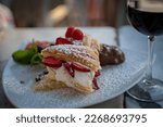 Small photo of A sampler of italian desserts to share eith red wine