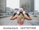 The Blonde Girl In A Pink Hat...