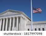 Small photo of WASHINGTON - SEPTEMBER 19, 2020: US SUPREME COURT flies USA flag at half-mast to mourn the death of JUSTICE RUTH BADER GINSBURG