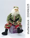 Santa Claus Doll Is Sitting On...