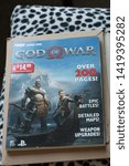 Small photo of MATLOCK, UNITED KINGDOM, 8th June 2019: Official strategy guide in paperback for the god of war game