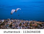 Paragliders Over The City Of...