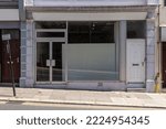 Small photo of Empty shop front on a shopping street a feature of the economic downturn