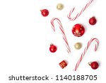 A lot of christmas candies and balls isolated on white background