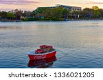Small photo of Orlando, Florida . February 26, 2019. Coca Cola boat and Shamu Stadium at Seaworld Theme Park.