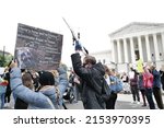 Small photo of Washington, DC – May 08, 2022: Protesters at the Supreme Court demonstrate their views in support of the court upholding Roe v. Wade in spite of courts recently leaked draft opinion.