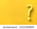 Small photo of Yellow question mark on orange background. 3d model, mock-up of interrogation point with copy space. Important information, dispute, hesitation concept.