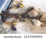 Sand Making Plant and Belt conveyor in mining quarry. Mining excavator loading=