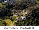 Small photo of Banos, Ecuador, 1-10-2023: Aerial side view of the hotel Luna Volc?n