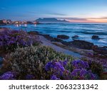 Evening view of Table Mountain viewed from Big Bay Blouberg Cape Town, Western Cape, South Africa.