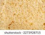 Small photo of Yellow vanilla sponge biscuit cake texture. Macro shot of cake cut. Pastry dough textured background