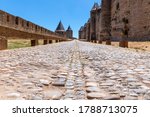 Ancient paved stone road in the medieval castle of Carcassonne town