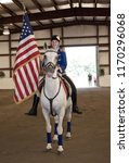 Small photo of Buton, Maine / USA - August 26 2012: Herrmann's Royal Lipizzan Stallions at Hearts & Horses Therapeutic Riding Center