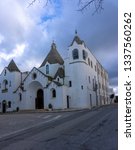 Small photo of Alberobello, Italy - 14.02.19: View of the Church of Sant'Antonio di Padova, known as the Hammer of the Heretics, built for 14 months in 1927 using the same traditional technique as for the trullo.