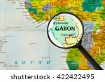 Small photo of Map of Gabonese Republic through magnigying glass